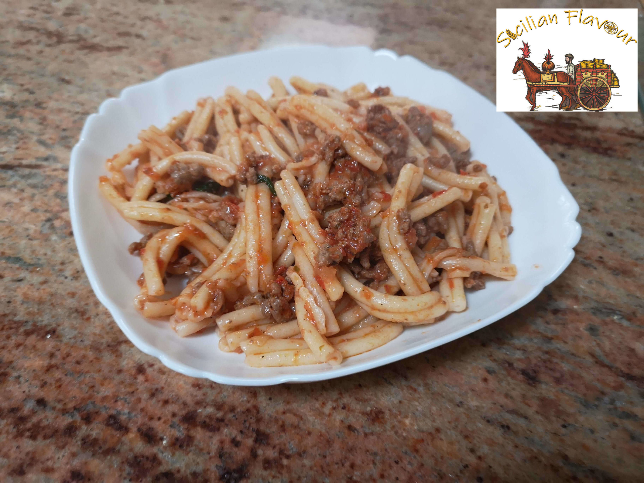 Caserecce with ragu, traditional Sicilian Flavour pasta
